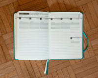 Blank Weekly Spread - 2027 Mental Fitness Diary Planner. It shows there is space for weekly goals, a motivational quote, and room to block out space for the week ahead. 