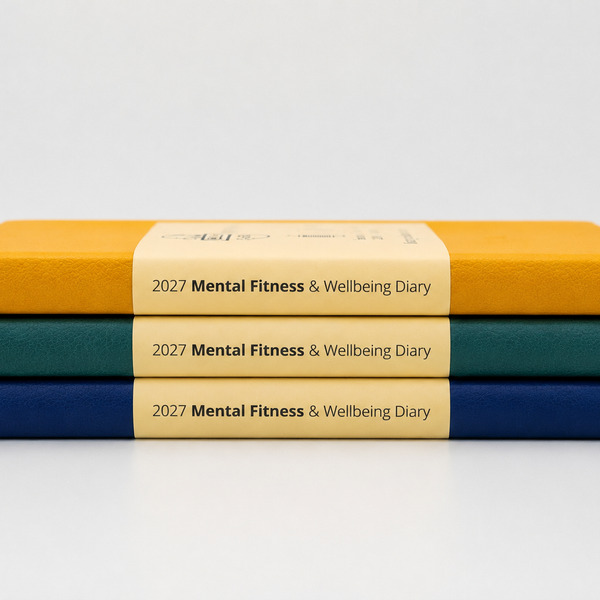 Three colours for the 2027 Mental Fitness Diary. Golden Mustard, Classic Navy, Forest Green. They are stacked on top of each other